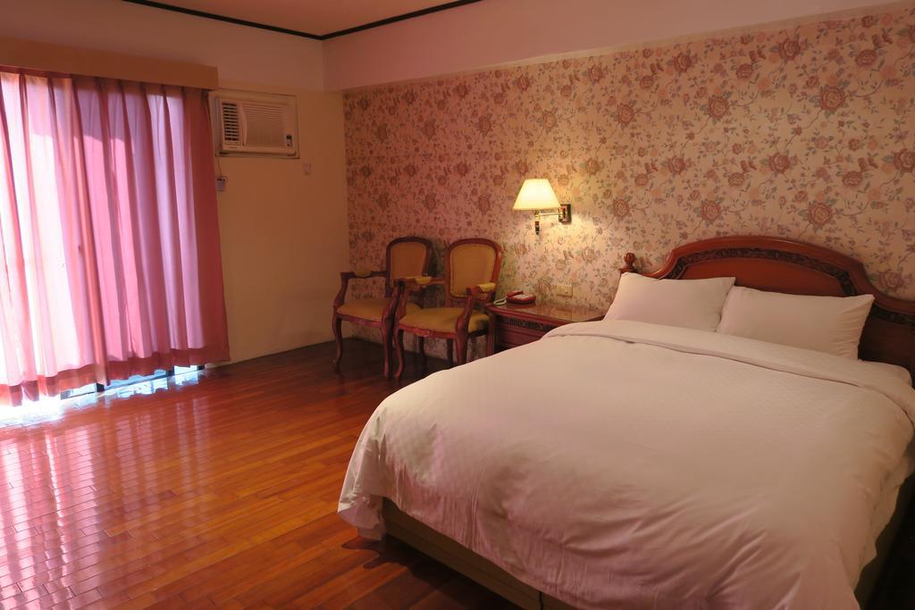 Champagne Hotel Jiaoxi Chambre photo