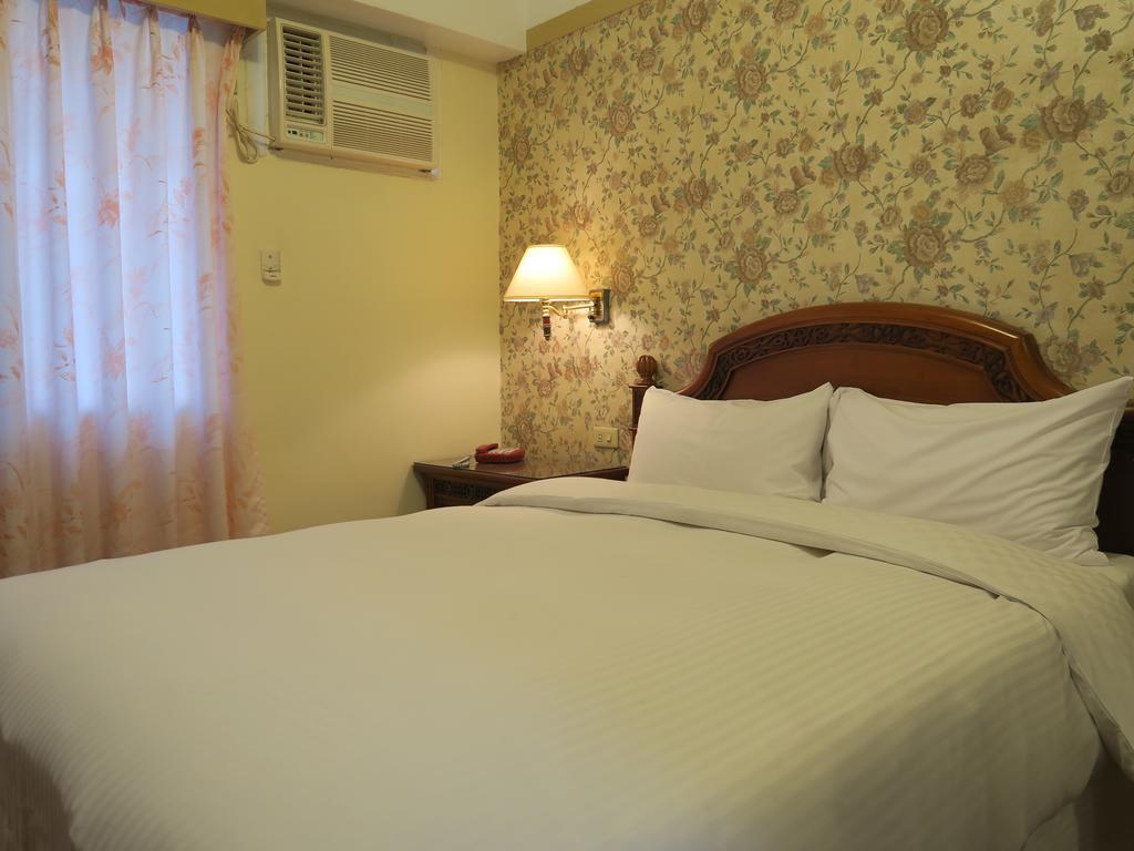 Champagne Hotel Jiaoxi Chambre photo
